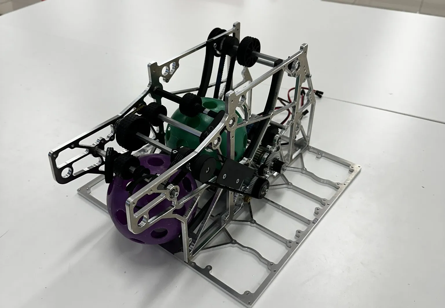 New transfer mechanism assembled on a base plate with balls loaded