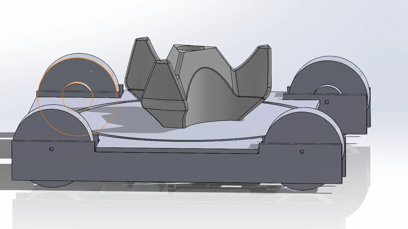 Early whole-robot block CAD with a central spindexer and surrounding drivetrain
