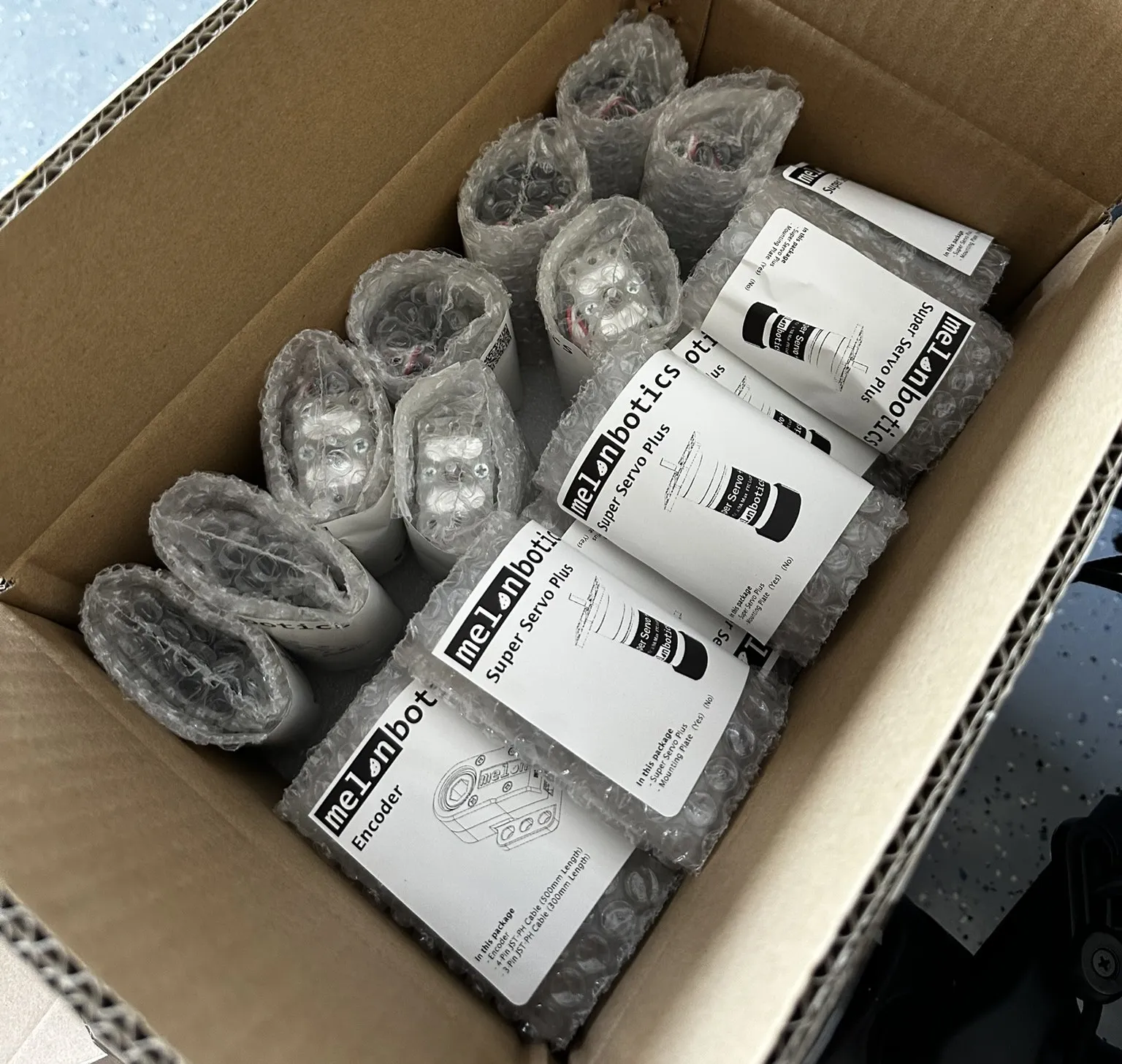Packaged Super Servo Plus units ready for customers