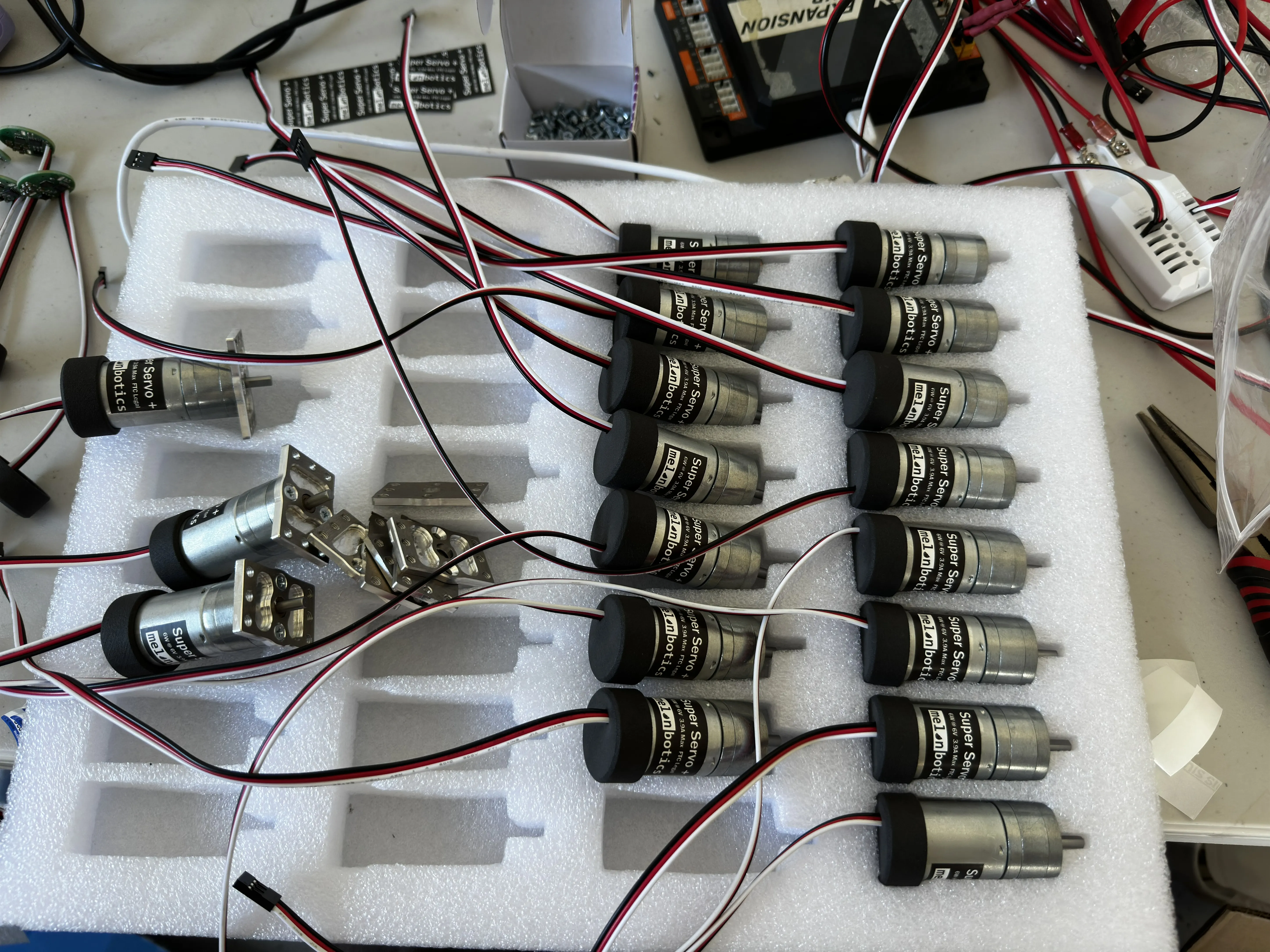 Tray of assembled Super Servo Plus units